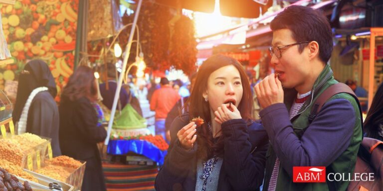 a man and woman eating foods together