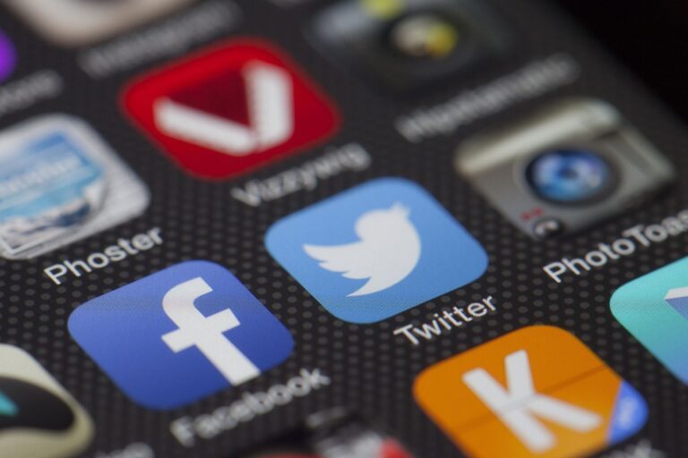 a close up shot of a phone with apps shown