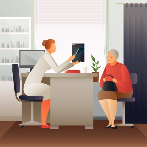 Medical office assistant talking to a female patient 