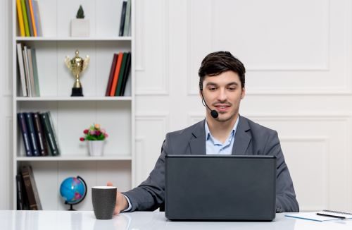 Administrative Assistant while working and drinking coffee