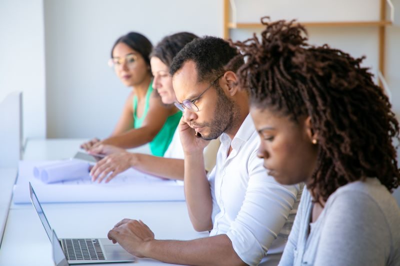 A group of students studying digital marketing