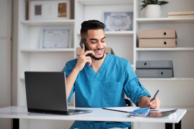 Healthcare Admin on phone with a patient booking an appointment