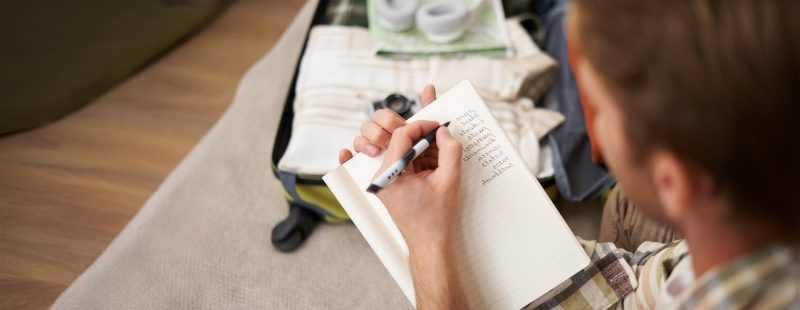 Close up portrait of a man verifying his checklist