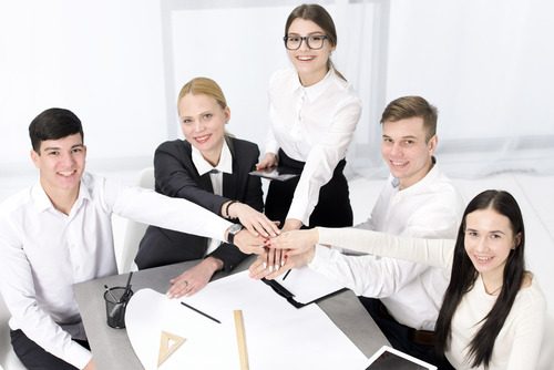 Team of HR Administrators working together in a company